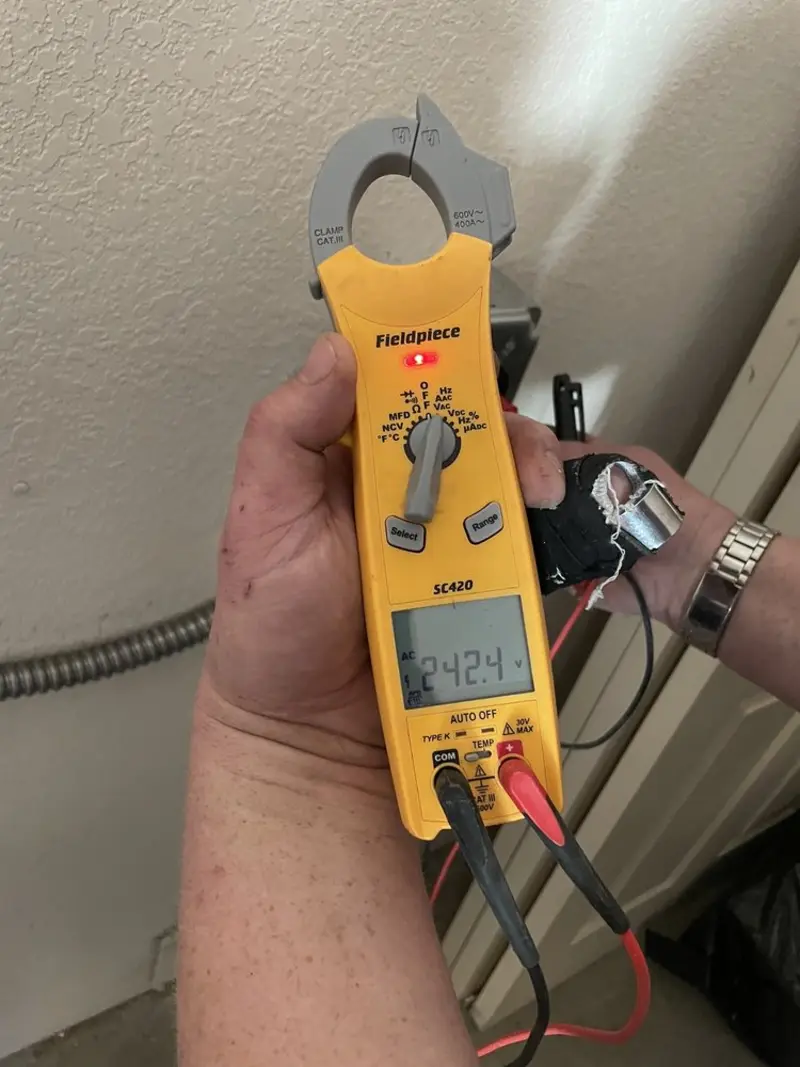 Voltage testing with clamp meter during Recessed Lighting Installation in Antioch